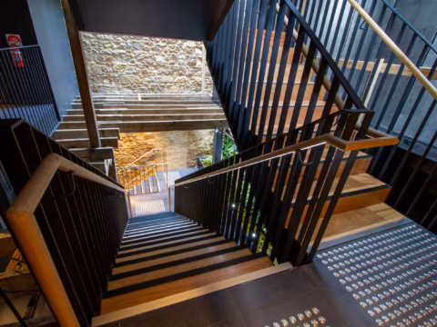 Timber and steel stair linking the heritage buildings at Wharfstone Hotel